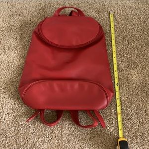 Longchamps Vintage Redleather backpack.